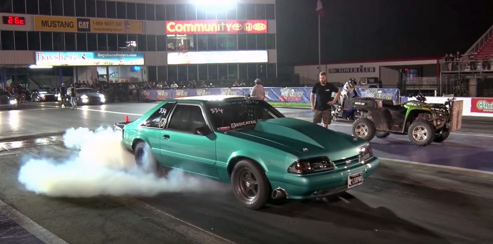 Bright teal Fox Mustang sends 1,400 horsepower down the strip